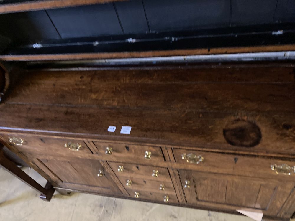 A George III oak dresser, width 155cm, depth 46cm, height 205cm